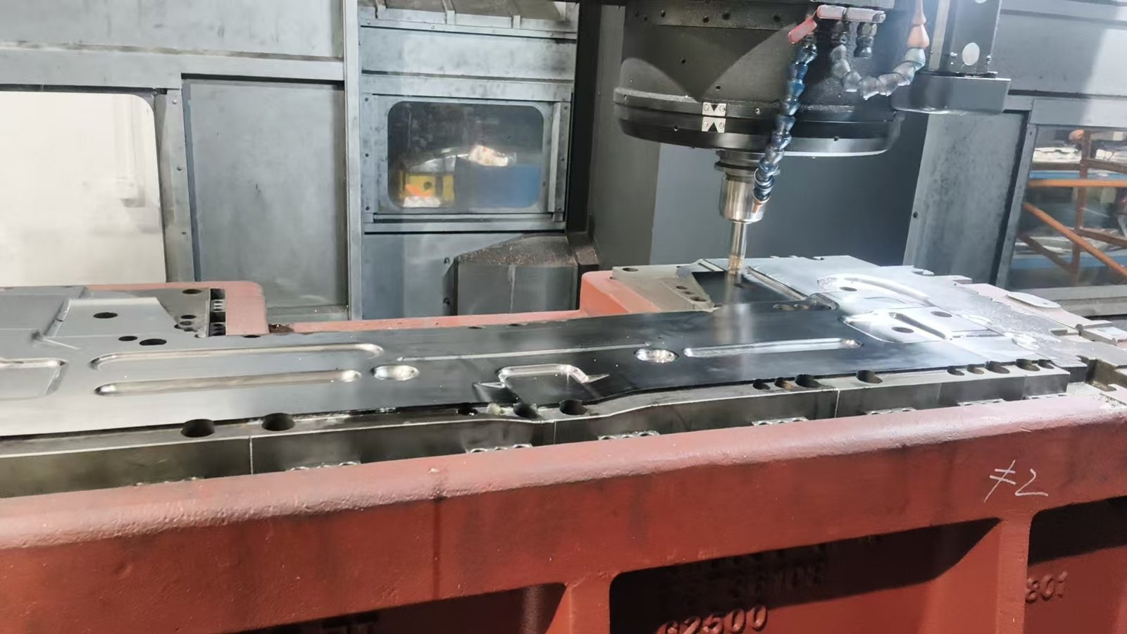 VELE gantry machining center finishing an SKD11 stamping die with KXG250TD 0612-S at HRC 60–62